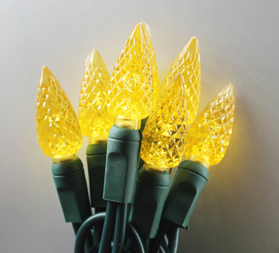 A corda do diodo emissor de luz da morango C6 ilumina o UL amarelo das luzes de Natal